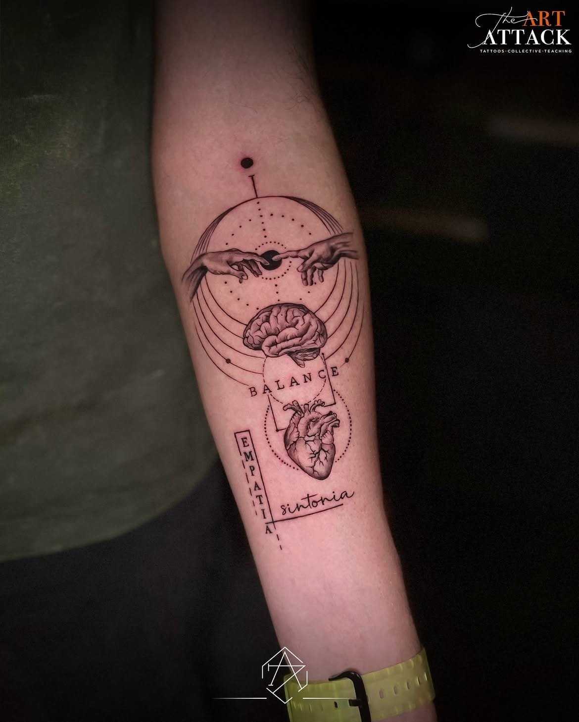 Japanese characters tattooed on a forearm inside a red brushed circle.